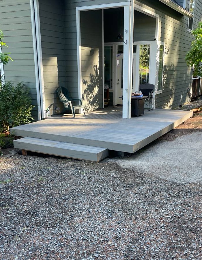 Modern backyard deck with clean, minimalist design.